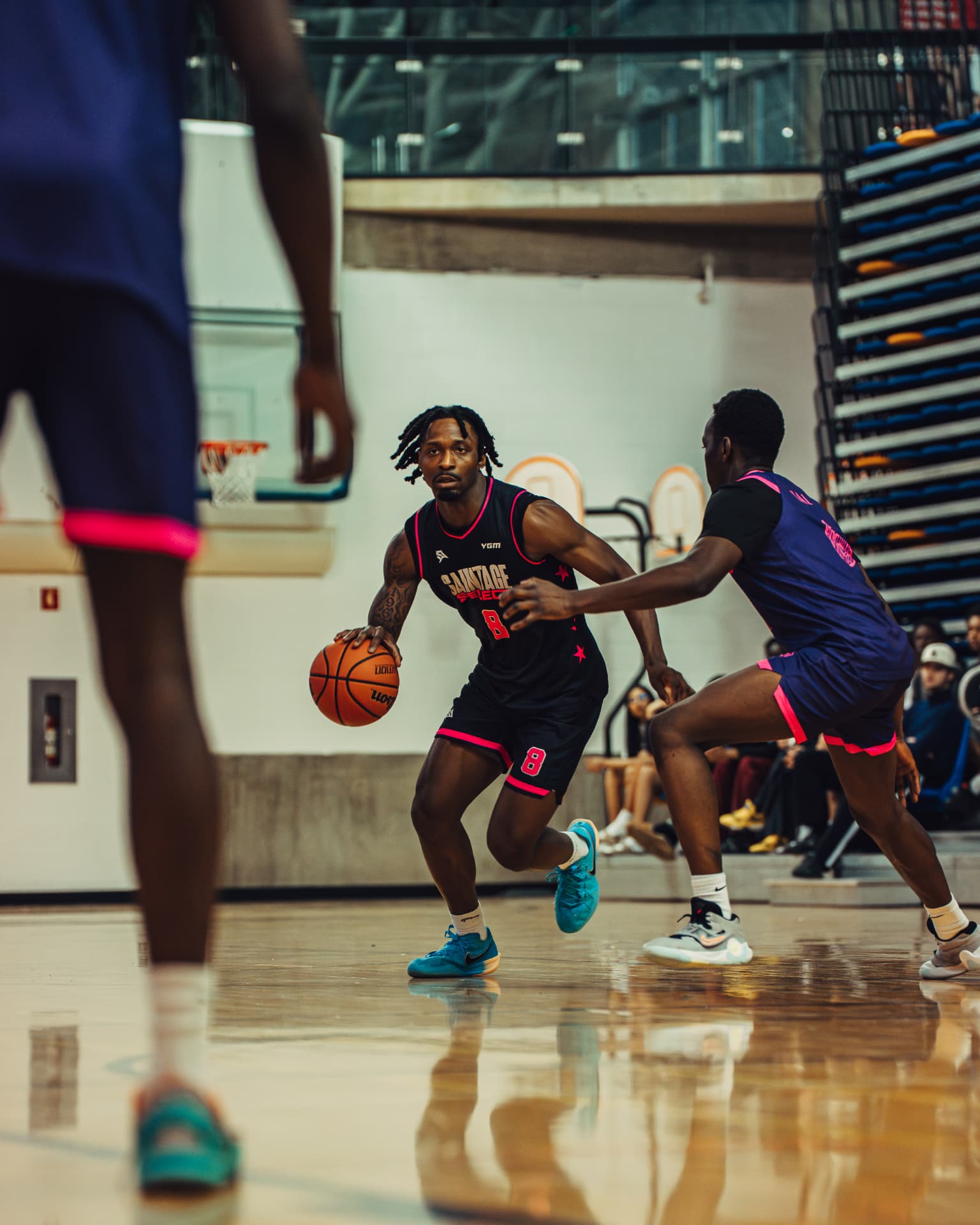 Player driving the ball past a defender