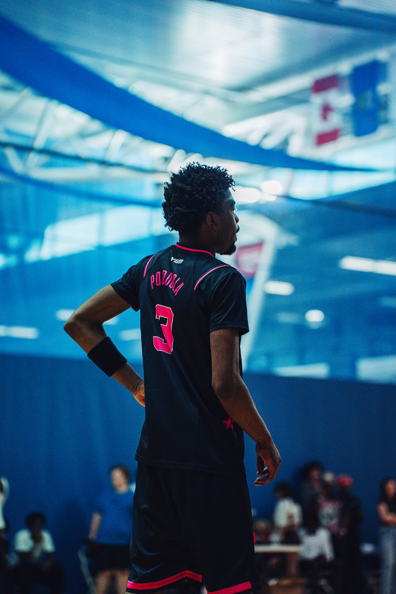 Player number 3 waiting on the court
