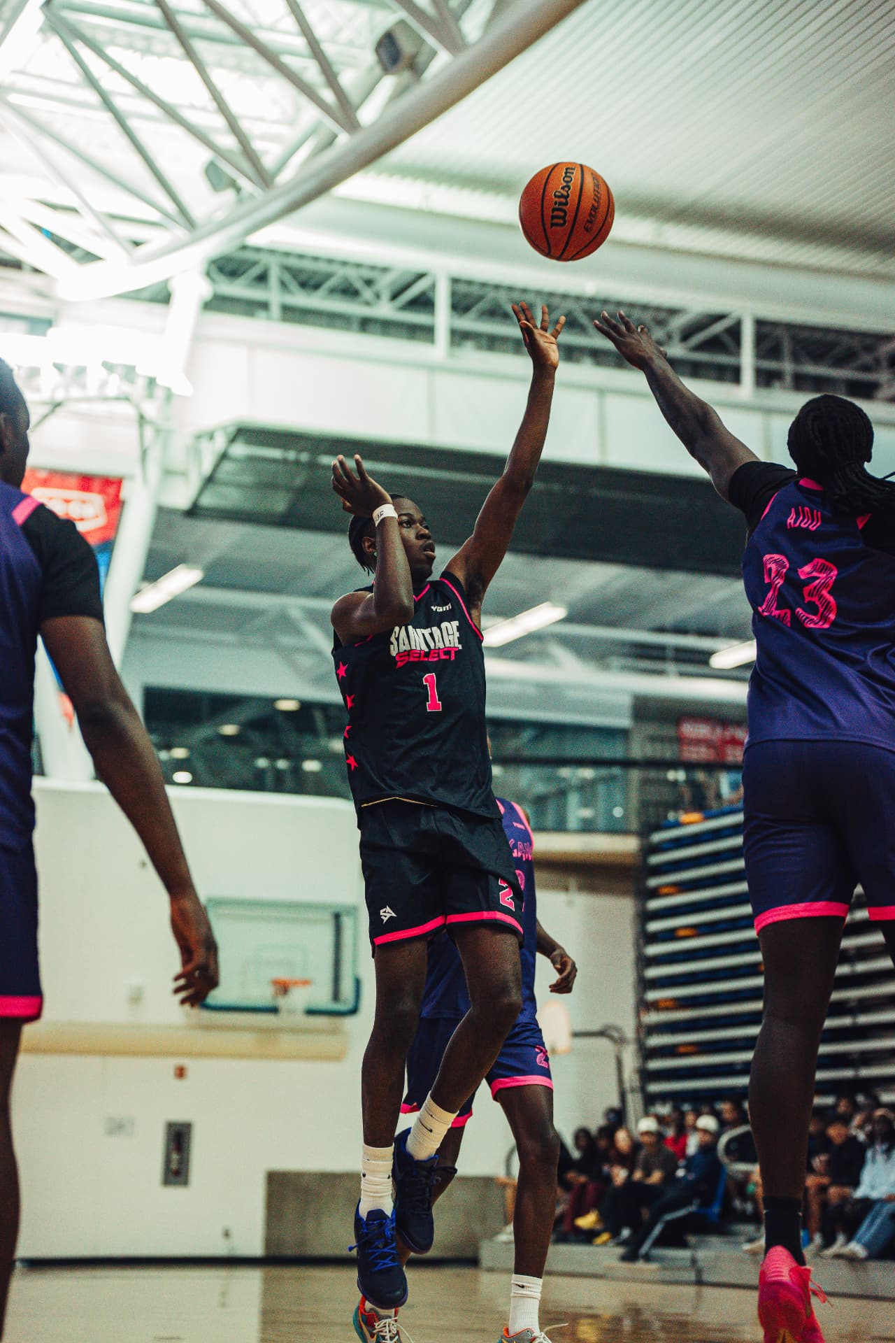 SAINTAGE Select guard shooting a contested jumper